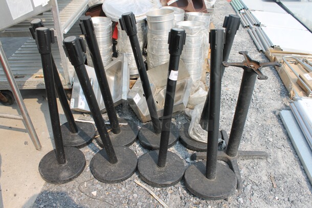 9 Black Stantions. 9 Times Your Bid! Cosmetic Condition May Vary.
