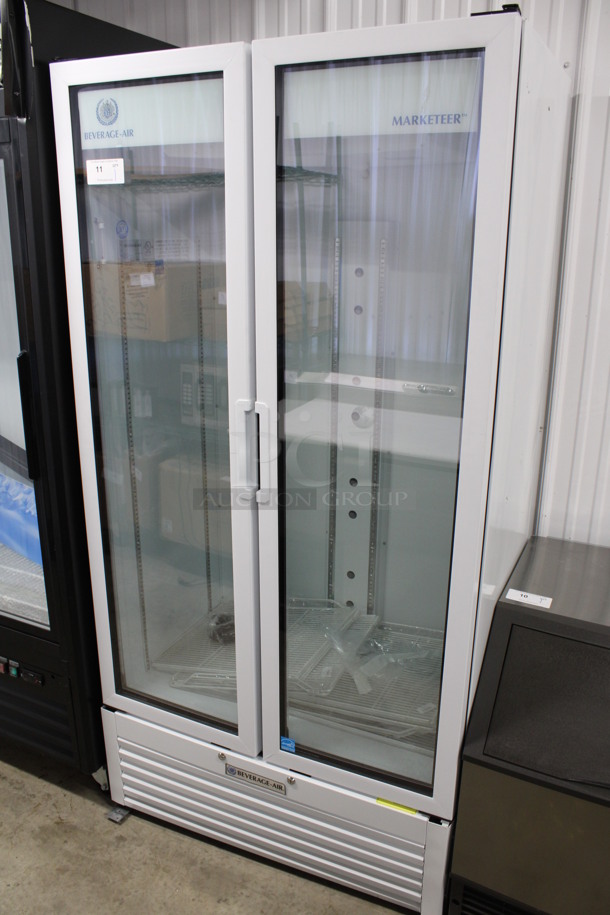 BRAND NEW SCRATCH AND DENT! Beverage Air Model MT34-1 Marketeer ENERGY STAR Metal Commercial 2 Door Reach In Cooler Merchandiser w/ Poly Coated Racks. 115 Volts, 1 Phase. 39x26x79. Tested and Working!
