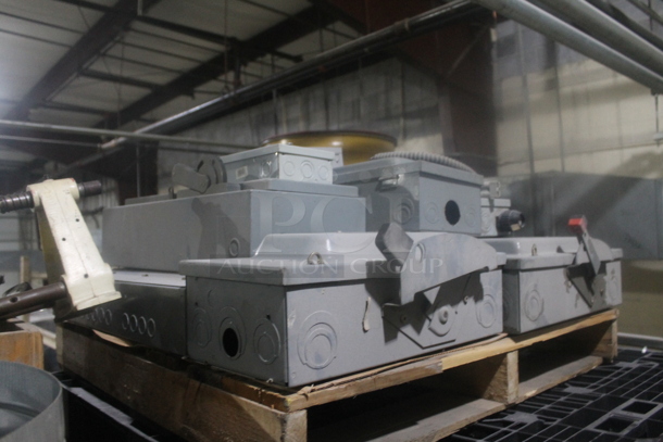 ALL ONE MONEY! Lot of Various Pallets; Black Poly and 1 Wooden w/ Gray Square D Metal Control Boxes. BUYER MUST REMOVE. - Image 4 of 4