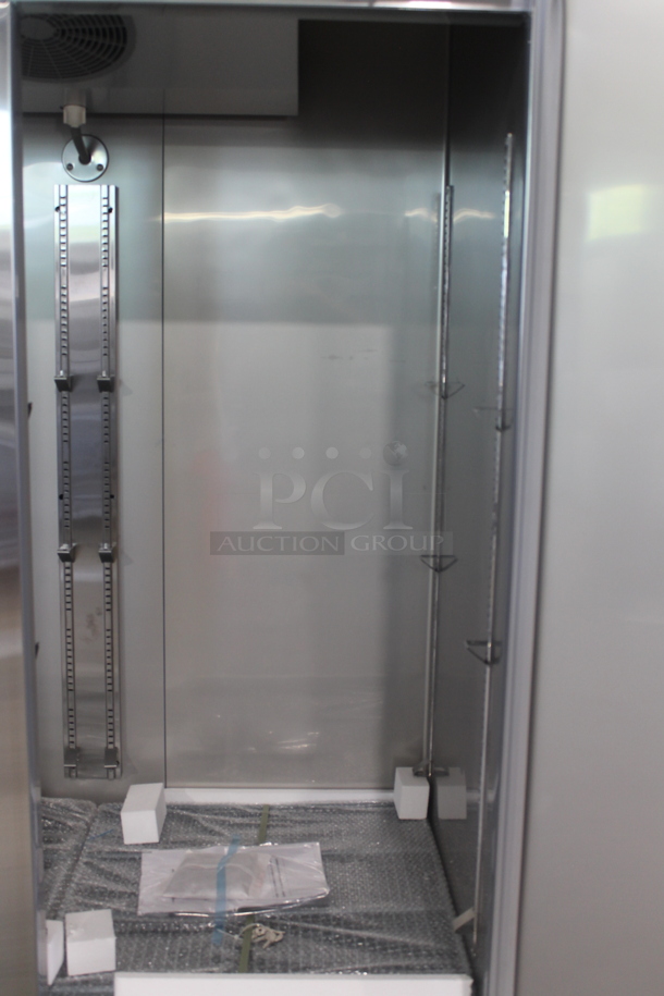 BRAND NEW SCRATCH AND DENT! 2023 KoolMore RIR-2D-SS  Stainless Steel Commercial 2 Door Reach In Cooler w/ Poly Coated Racks on Commercial Casters. 115 Volts, 1 Phase. Tested and Working! - Image 4 of 9