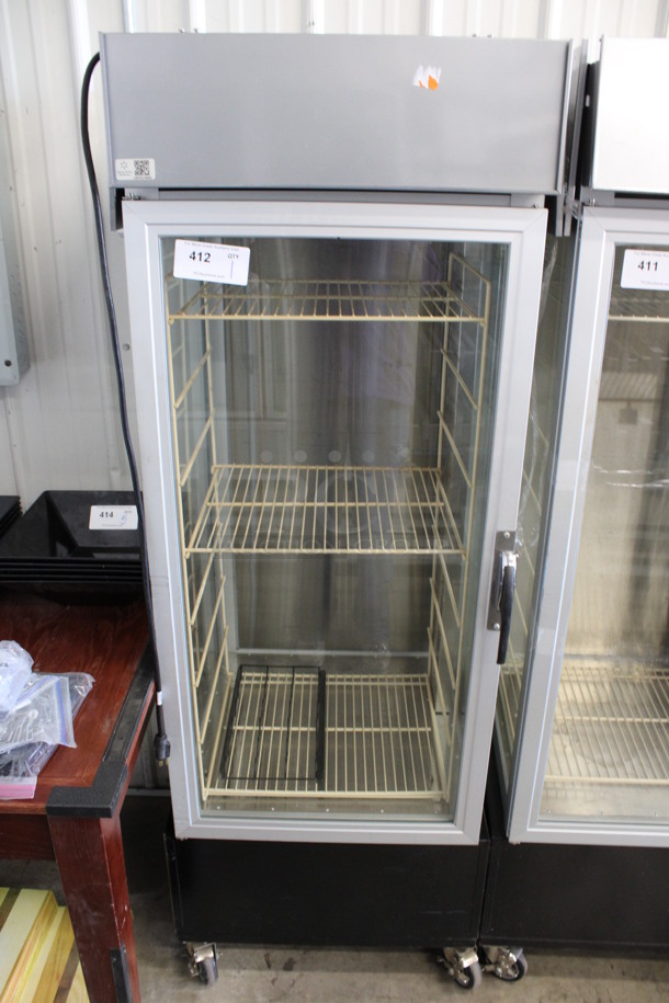 Hatco Model PFST-1X Stainless Steel Commercial Heated Single Door Reach In Merchandiser w/ Poly Rack on Commercial Casters. 120 Volts, 1 Phase. 24.5x24x70. Tested and Working!