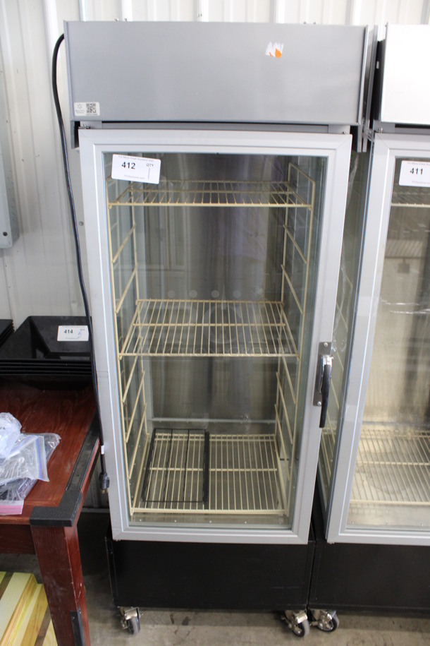 Hatco Model PFST-1X Stainless Steel Commercial Heated Single Door Reach In Merchandiser w/ Poly Rack on Commercial Casters. 120 Volts, 1 Phase. 24.5x24x70. Tested and Working! - Image 1 of 5