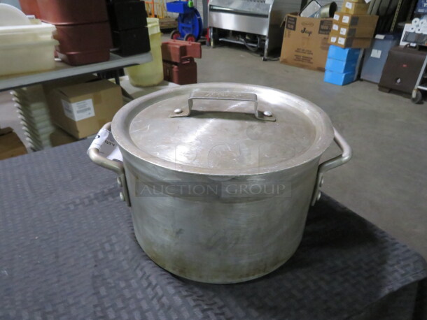 One Aluminum Stock Pot With Lid.