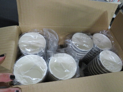 One Lot Of Cups And Lids.