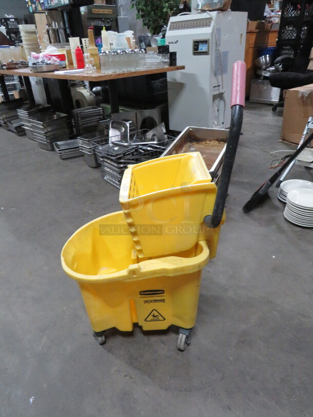 One Rubbermaid Mop Bucket And Wringer. - Image 1 of 1
