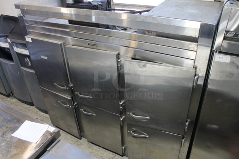 Traulsen Stainless Steel Commercial 6 Half Size Door Reach In Cooler on Commercial Casters. 115 Volts, 1 Phase. Tested and Powers On But Does Not Get Cold
