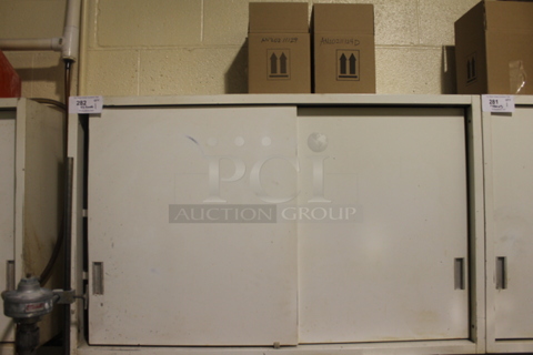 White 2 Door Cabinet w/ Contents Including Epoxy. BUYER MUST REMOVE.