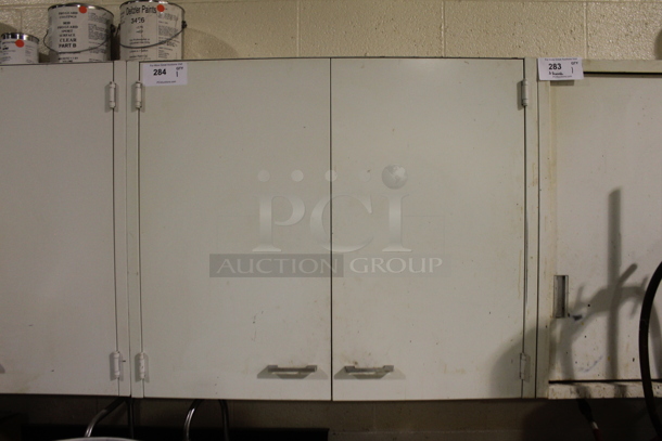 White 2 Door Cabinet w/ Contents Including Fungitrol. BUYER MUST REMOVE. - Image 1 of 5