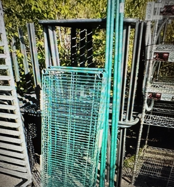 One Green Metro Shelf With 4 Shelves. 48X18X74.5. Assembly Required.  - Image 1 of 1