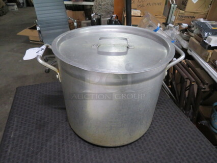 One 12X10 Aluminum Stock Pot With Lid. 