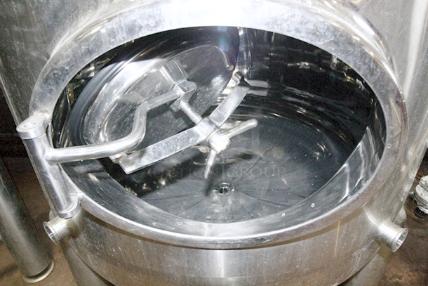? ? BEAUTIFUL!! Stout Tanks & Kettles - 15 BBL Fermenter / Unitank (Jacketed). ? ? Features: Easily Converts to a Unitank or Brite Serving Tank; Glycol Jacketed - 2 Zones: Cone and Sidewall; Shadowless Manway for Easy Cleaning; Adjustable Racking Arm for Clear Transfer; 1.5" Sample Valve for Quality Testing; Back Mounted Pressure Gauge; Adjustable Feet for Leveling on Uneven Floors or Fine Height Adjustments; Pressure Gauge Type: Back Mount; CIP Arm and 2.5" Rotating CIP Spray Ball; 2 Butterfly Valves; Rated to 2-Bar (29 PSI); 1/2" NPT Welded Thermowell for Contactless Temperature Probe Tank Thickness: 3mm Jacket and Outer Shell Thickness: 2mm. Cone: 60 degree Interior Angle. 51.5-in. diameter x 125-in.H. - Image 3 of 8