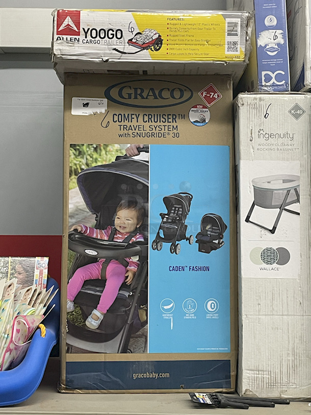 MASSIVE LOT! (3) Little Tikes 2-In-1 Snug & Secure Swings – 1 Blue, 2 Pink; (17) Nuby Water Resistant Baby Bibs (assorted colors); (1) Graco “Caden Fashion” Comfy Cruiser™ Travel System With Snugride® 30; (1) Allen YOOGO CZ2 Convertible Cargo Trailer → Handy Pull Cart,  (1) Delta Children Sweet Slumber Bassinet, (1) Chicco LullaGo Portable Bassinet, (1) Chicco NextFit Sport Convertible Car Seat, (2) Evenflo Omni Plus Modular Travel System – Includes LITEMAX Rear-Facing Infant Car Seat, (1) Baby Trend EZ Ride Girl 35 - Includes NEW 4-35 Ibs Infant Car Seat , (1) Evenflo Nurture Infant Car Seat Base. 11x Your Bid - Image 4 of 12