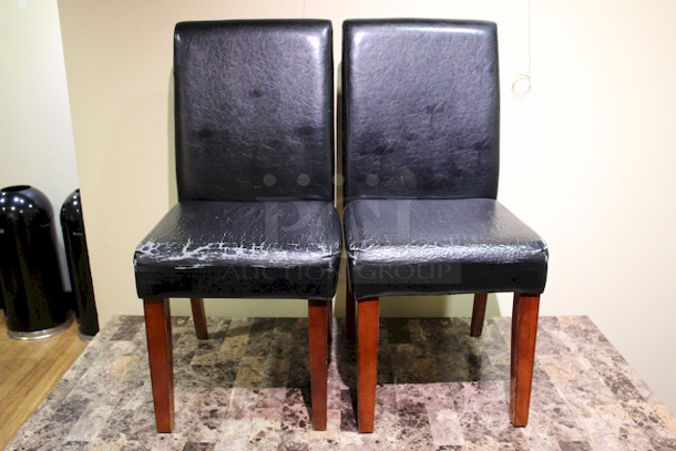 Set of (2) Burgundy Padded Chairs. 23x18-1/2x39. 2x Your Bid.