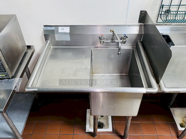 SPRECTACULAR! Duke Manufacturing SDTS-2116-11L Stainless Steel Prep Sink with Left Side Drainboard. 
Condition: 10
Comes complete with faucet. Bowl measures 16 x 21 x 13 inches.

36-1/2x27x44 - Image 5 of 6