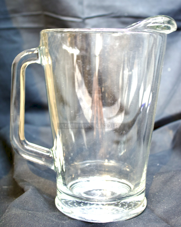 HUGE LOT! 2 Flatware Racks Full Of 15 Heavy Duty Glass Pitchers. 2x Your Bid - Image 1 of 3