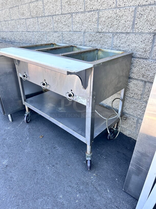 Late Model Duke E303 44 inch Hot Food Table w/ (3) Wells & Cutting Board, On Casters 115v/1ph Working  - Image 4 of 6