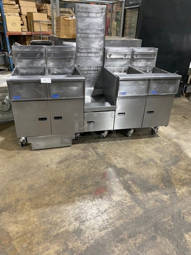 FAB! Pitco Frialator Commercial Natural Gas Powered 4 Bay Deep Fat Fryer! With Middle Fryer Basket Rack! With Oil Filter System! All Stainless Steel! On Casters! Model: SGH50 SN: G10HC034159! Working When Removed!