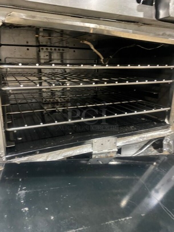 WOW! Vulcan Commercial Natural Gas Powered Flat Top Griddle With 2 Burner! Flat Griddle Has Side Splashes! With Raised Back Splash And Salamander Shelf! With Oven Underneath! All Stainless Steel! On Casters! Model: 48C2B36GN SN: 650094075 - Image 2 of 8