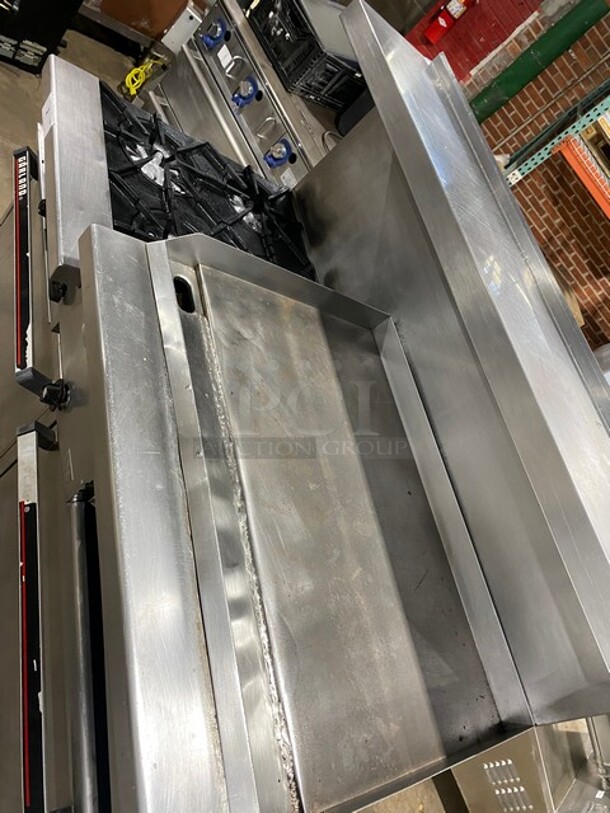 Garland Stainless Steel Commercial Gas Powered 4 Burner Range w/ Right Side 36 Inch Flat Top Griddle! With Cheese Melter! 2 Full Size Ovens! On Casters! - Image 5 of 12