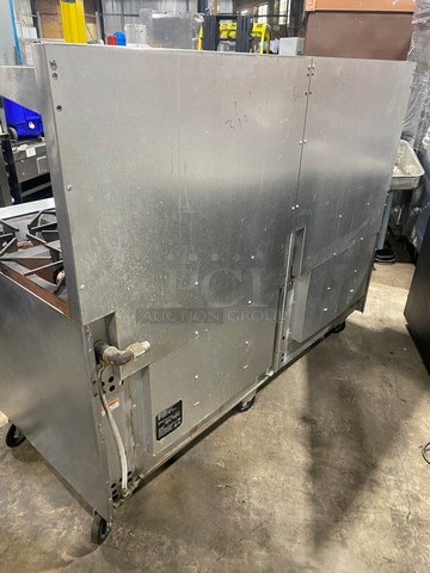 Vulcan Commercial Natural Gas Powered 12 Burner Stove! With Raised Back Splash And Salamander Shelf! With 2 Oven Underneath! All Stainless Steel! On Casters! WORKING WHEN REMOVED! Model: G72SS1AA SN: 659011300 - Image 3 of 11
