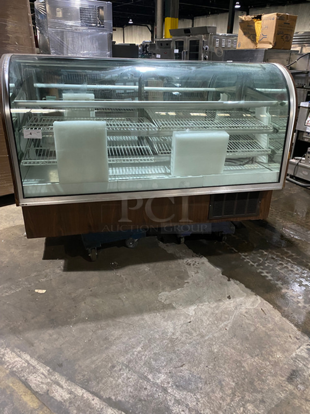NICE! Spartan Commercial Refrigerated Bakery Showcase Merchandiser! With Curved Front Glass! With Sliding Back Door Access! With Poly Coated Racks! Model: 57RO