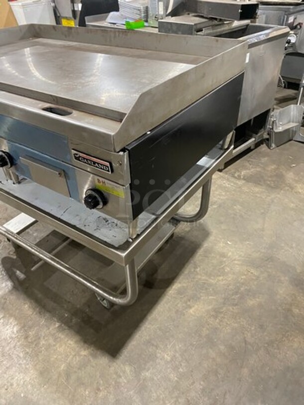 WOW! NEW! NEVER USED! Garland Commercial Countertop Electric Powered Flat Top Griddle! With Back And Side Splashes! On Legs! On Equipment Stand! All Stainless Steel! On Casters! Model: E2448G SN: 0404ME0033 208V 60HZ 3 Phase - Image 2 of 9