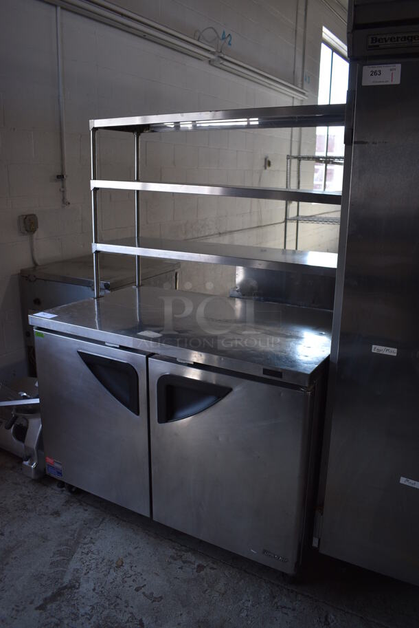 Turbo Air Model TUR-48SD-N Stainless Steel Commercial 2 Door Work Top Cooler w/ 2 Over Shelves on Commercial Casters. 115 Volts, 1 Phase. 48x30x67.5. Tested and Working!