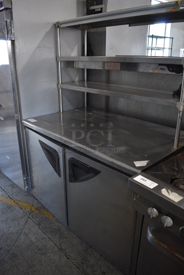 Turbo Air Model TUR-48SD Stainless Steel Commercial 2 Door Work Top Cooler w/ 2 Over Shelves on Commercial Casters. Doors Do Not Stay Closed. 115 Volts, 1 Phase. 48x30x69. Tested and Working!