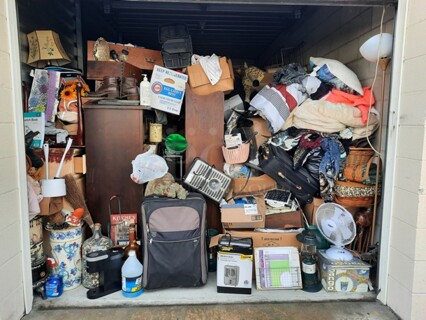 ALL ONE MONEY! Lot of Entire Contents of Storage Unit #29. Unit Size: 10 x 20. Unit Appears to Contain: Dressers, Bookshelves, Box Spring & Mattress, Wooden Bed, Couch, Chairs, Tables, Fan, Heaters, Bottle of Buttons, Longaberger Baskets, Lights, Mirror, Ironing Board, Rugs, Suitcases, Trashcan, Keurig, Blankets, Clothes, Shoes, Kerosene Heater, Large Stuffed Giraffe, Fake Plants, Bags, Totes & Boxes. Cleaning Deposit of $100 per Unit Paid on Pickup Day. Winner Has 7 Days From Close of Auction to Remove Items. All Items Must Be Removed and Unit Must Be Broom Swept to Get Cleaning Deposit Returned. Invoice and Cleaning Deposit Must Be Paid In Full by 4:00pm Tuesday, March 7th. Unit Must Be Cleared Out By 4:00pm Monday, March 13th. Please Come Into The Office To Settle Your Invoice and You Will Be Taken To Your Storage Unit for Cleanout. If You Plan To Clear Out Your Unit Saturday or Sunday You Need To Report To Our Office During The Week Before 4:00pm To Gain Access To Your Unit As Our Office Is Closed On Weekends.