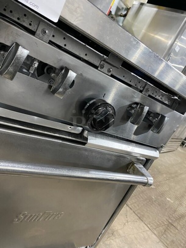 Commercial Natural Gas Powered 4 Burner Stove! With Raised Back Splash! With Oven Underneath! Stainless Steel Body! On Casters! - Image 9 of 10
