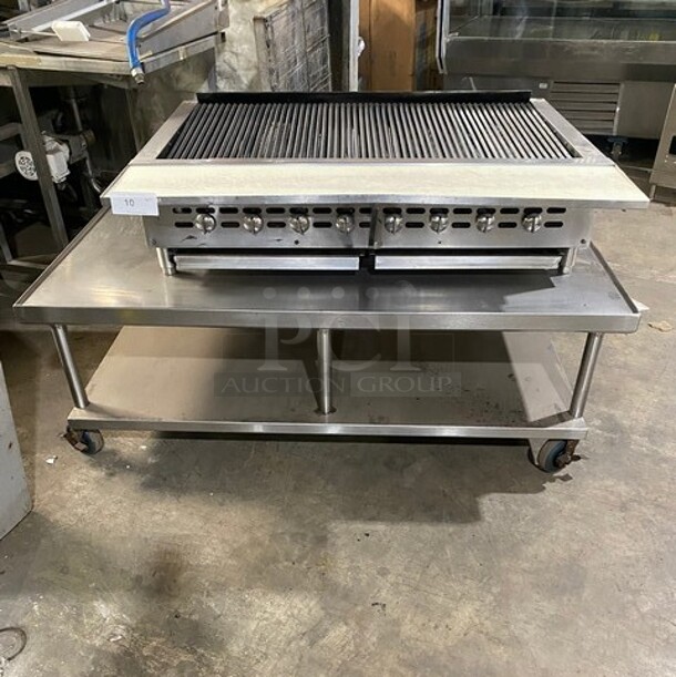 Bakers Pride Commercial Countertop Natural Gas Powered 48 Inch Char Broiler Grill! On Commercial 60 Inch Equipment Stand! With Underneath Storage Space! All Stainless Steel! On Casters! Working When Removed! Model XX8 Serial 592381707002! - Image 1 of 10