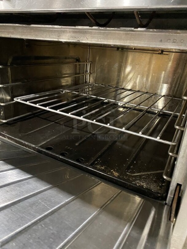 NICE! Us Range Commercial Heavy Duty Natural Gas Powered French Top/Hot Plate Range! With Full Size Oven Underneath! All Stainless Steel! With Oven Racks! On Casters!  - Image 6 of 10