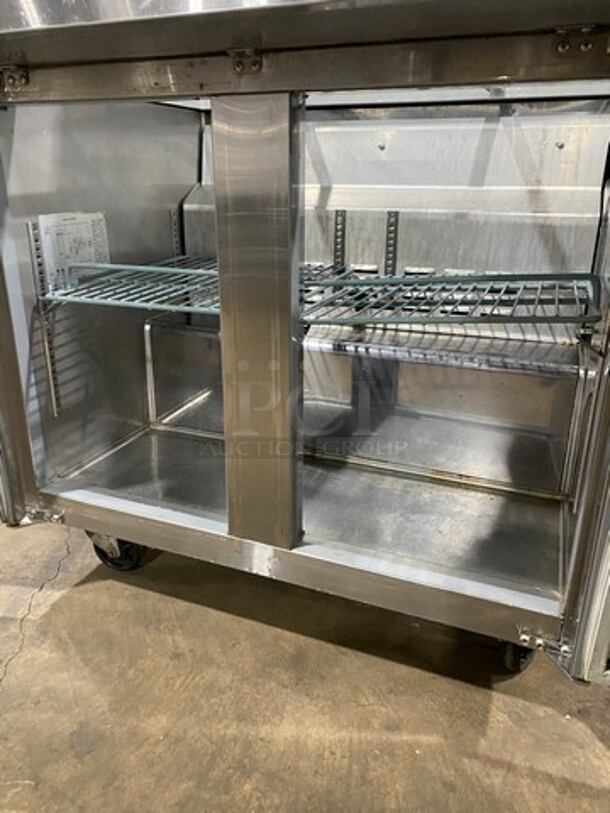 Universal Coolers Commercial Refrigerated Sandwich Prep Table! With 2 Door Storage Space Underneath! With Poly Coated Rack! All Stainless Steel! On Casters! Model: SC36BMI SN: 6733424419111105 115V - Image 5 of 10