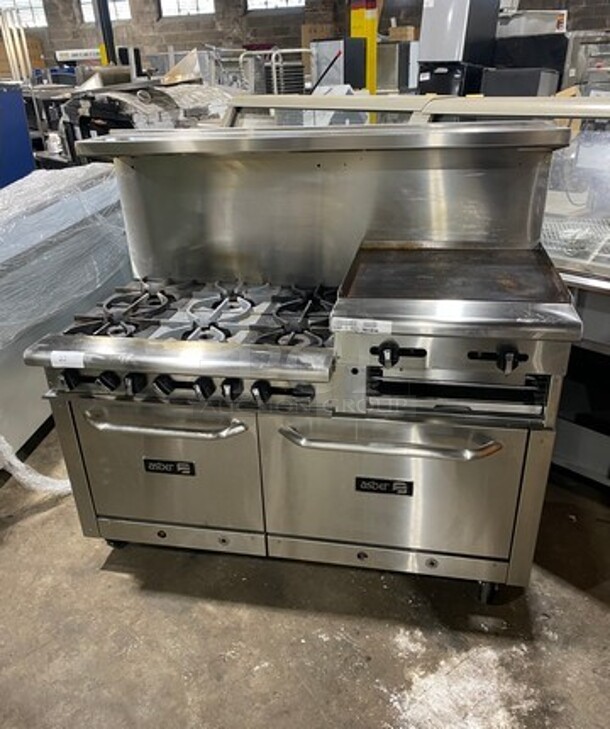 WOW! LIke New! Late Model! 2023 Asber Commercial Natural Gas Powered 6 Burner Stove With Right Side Flat Griddle! Griddle Has Side Splashes! With Raised Back Splash And Salamander Shelf! With 2 Oven Underneath! All Stainless Steel! On Casters! Model: AEMR2RG24B660HNG SN: 8102666523! Working When Removed!