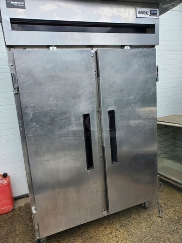 DELFIELD 6000XL Two Solid Door Refrigerator on Casters! 52X32X79
Tested and Working! - Image 2 of 7