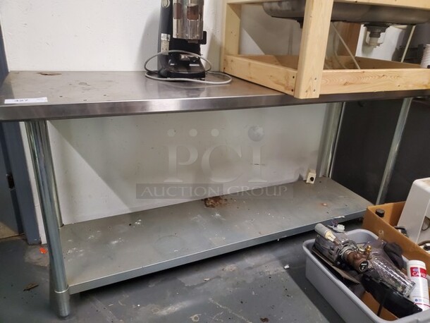 Stainless Steel Worktable 72X24X34 Like new! Buyer must remove it - Image 1 of 2