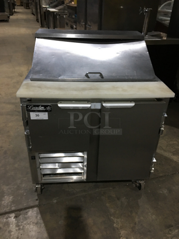 Leader Commercial Refrigerated Sandwich Prep Table! With 2 Door Underneath Storage Space! With Poly Coated Racks! With Commercial Cutting Board! All Stainless Steel! On Casters! Model: LM36 SN: PW08M1412 115V 60Hz 1 Phase