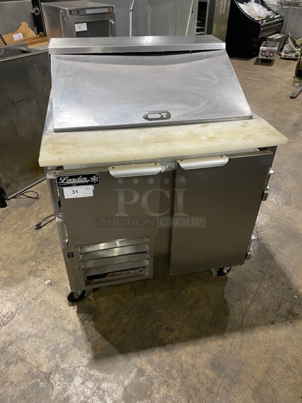 Leader Commercial Refrigerated Sandwich Prep Table! With 2 Door Underneath Storage Space! With Poly Coated Racks! With Commercial Cutting Board! All Stainless Steel! On Casters! Model: LM36 SN: PW08M1412 115V 60Hz 1 Phase