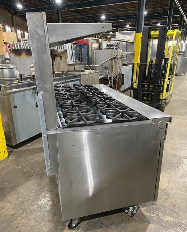 Southbend Commercial Natural Gas Powered 12 Burner Stove! With Raised Back Splash And Salamander Shelf! With 2 Full Size Oven Underneath! All Stainless Steel! On Casters! Working When Removed! - Image 3 of 10