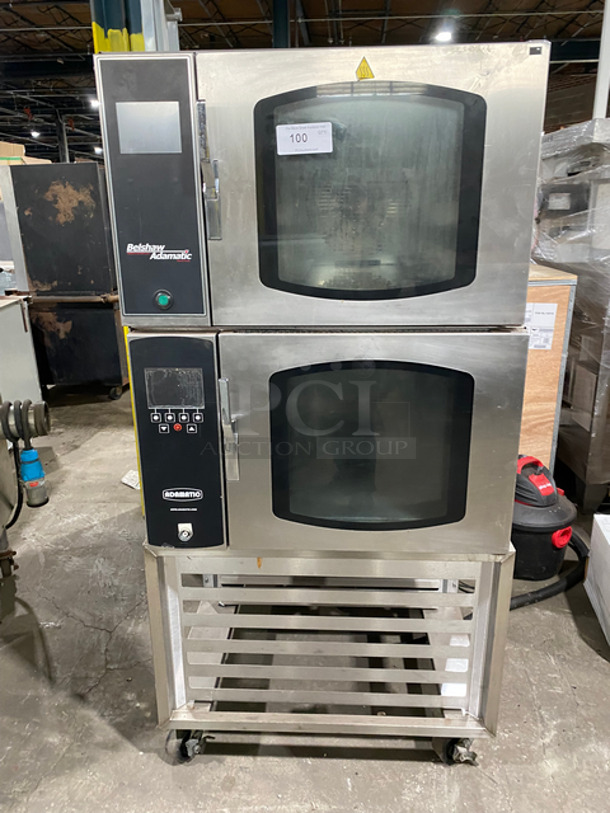 SUPER! Belshaw Adamatic Commercial Electric Powered Doble Deck Combi Oven! With View Through Doors! With Pan Racks Underneath! All Stainless Steel! On Casters! 2x Your Bid Makes One Unit! Model: FG189UZ84 SN: 2000003710FA032620 208/220V 60HZ 3 Phase