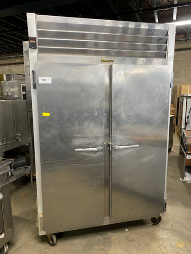Traulsen 2 Door Reach In Freezer Unit! With Poly Coated Racks! All Stainless Steel! On Casters! NOT TESTED! Model: G22010 SN: T94188D15 115V 60HZ 1 Phase