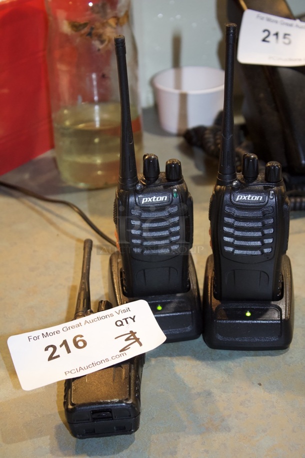 3 Pxton Walkie Talkies W/ 2 Charger Bases. Working 3x Your Bid