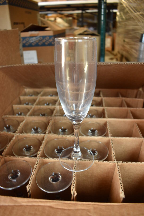 24 BRAND NEW IN BOX! Arcoroc Excalibur Flute 5.75 oz Champagne Glasses. 2.25x2.25x7.75. 24 Times Your Bid!
