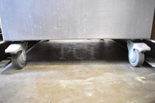 Fresh N Squeeze POS-1 Stainless Steel Commercial Floor Style Automatic Citrus Juicer on Commercial Casters. Missing Pieces. 120 Volts, 1 Phase. Tested and Working!  - Image 2 of 9