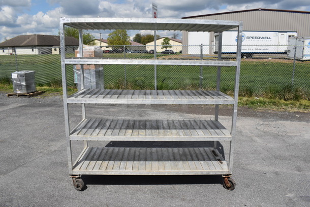 Metal 5 Tier Shelving Unit on Commercial Casters.  - Image 1 of 6