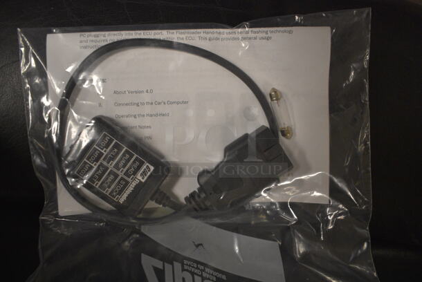 ALL ONE MONEY! Tier Lot of Various Items Including Plastic Containers, GIARC Handheld Flastloader, 2010 Audi License Plate Holder, and Grill Utensil Set - Image 3 of 7