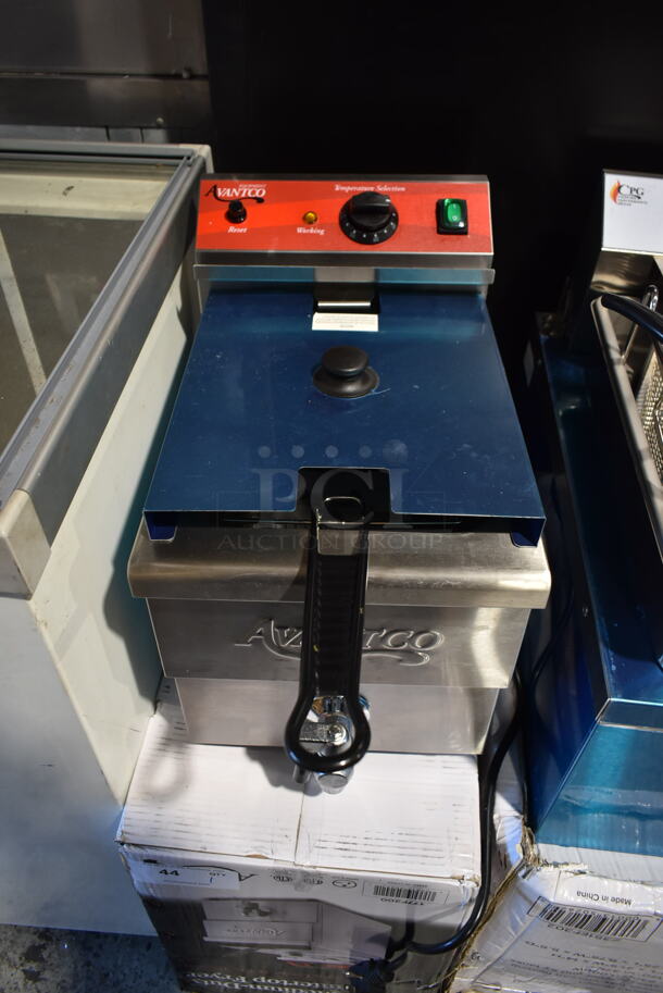 BRAND NEW SCRATCH AND DENT! 2023 Avantco 177F200 Stainless Steel Commercial Countertop Electric Powered Deep Fat Fryer w/ Metal Fry Basket and Lid. 208-240 Volts, 1 Phase.  - Image 1 of 4