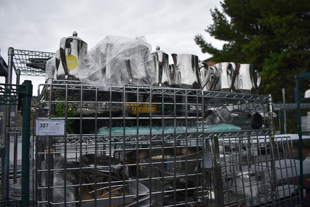 ALL ONE MONEY! Lot of Chrome Finish 5 Tier Shelving Unit on Commercial Casters w/ Liquor Cage and All Contents Including Metal Pitchers, White Ceramic Plates. BUYER MUST DISMANTLE. PCI CANNOT DISMANTLE FOR SHIPPING. PLEASE CONSIDER FREIGHT CHARGES. 49x25x68 - Image 4 of 7