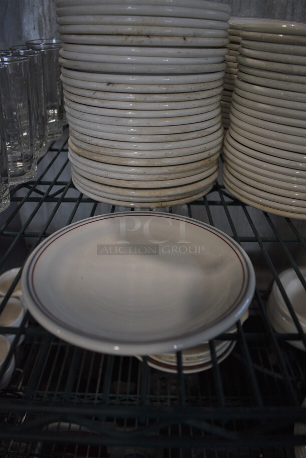 23 White Ceramic Plates w/ Gray and Red Line on Rim. 6.5x6.5x1. 23 Times Your Bid!