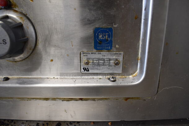 Wells Stainless Steel Commercial Work Station w/ Flat Top Griddle, Charbroiler, Well and Side Under Shelves. Does Not Come w/ Delfield 4 Drawer Chef Base: Goes GREAT w/ Item 246! 115 Volts, 1 Phase Refrigeration. 208-240 Volt, 3 Phase Heating. 114x36x34 - Image 3 of 10